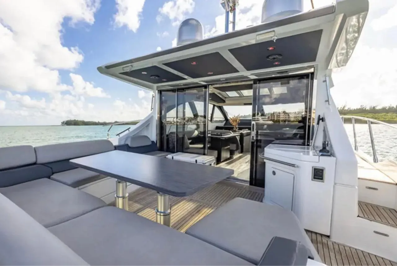 2015 Azimut 55S — aft cockpit with dining table