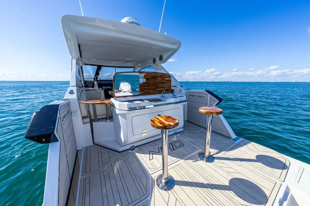 2025 NHD 365 HT — aft deck with wet bar and Garmin display